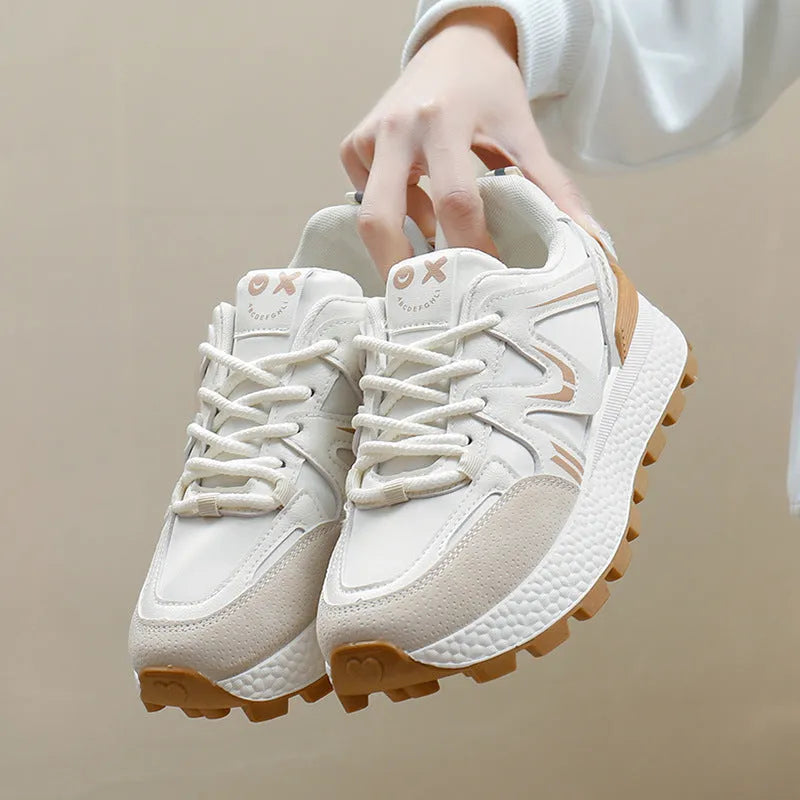 Women's solid colour platform casual shoes with lace-up front and round toe in black, grey, or khaki.