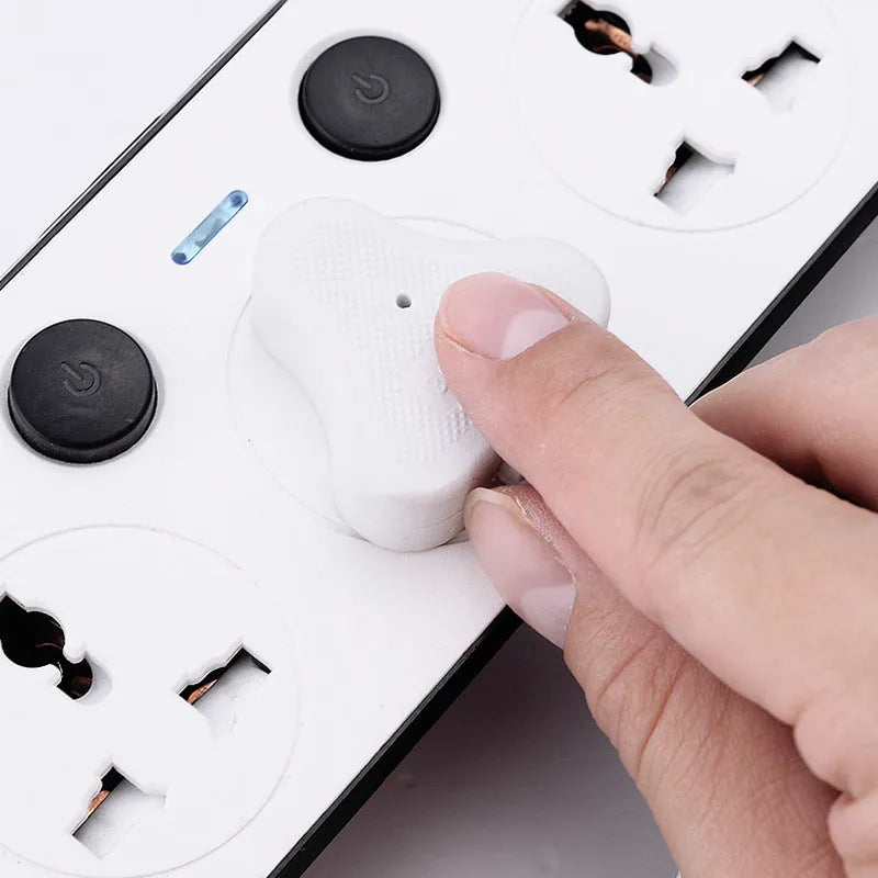 Multi-switch power strip with USB ports showing UK, US, and EU plug options and a coiled cable.