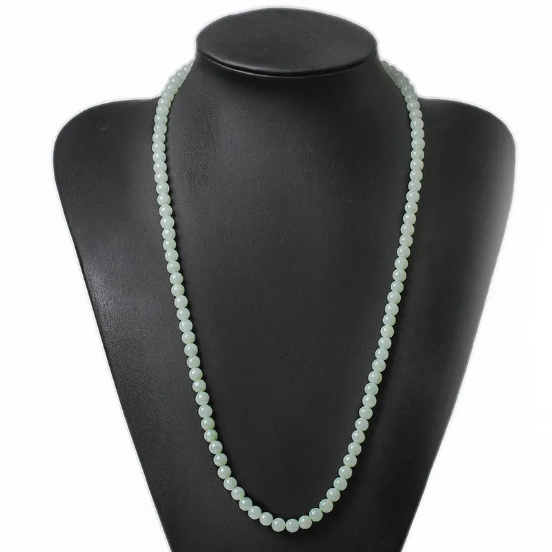 Natural jade bead necklace with white and green round beads on adjustable chain