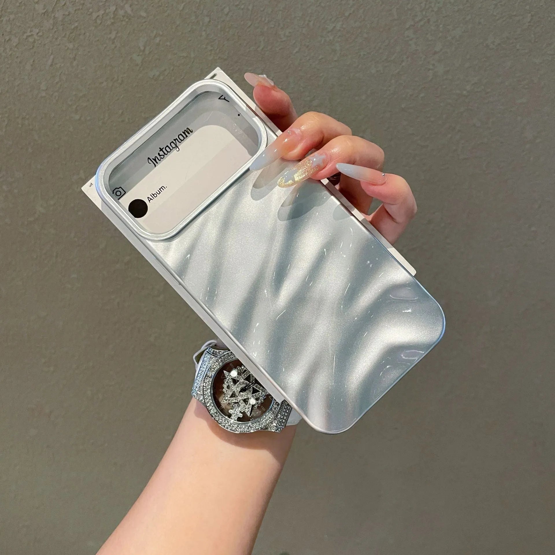 Soft wave pleated TPU phone case for Apple iPhone 17 in a selection of colours including electroplated gold and matte purple.