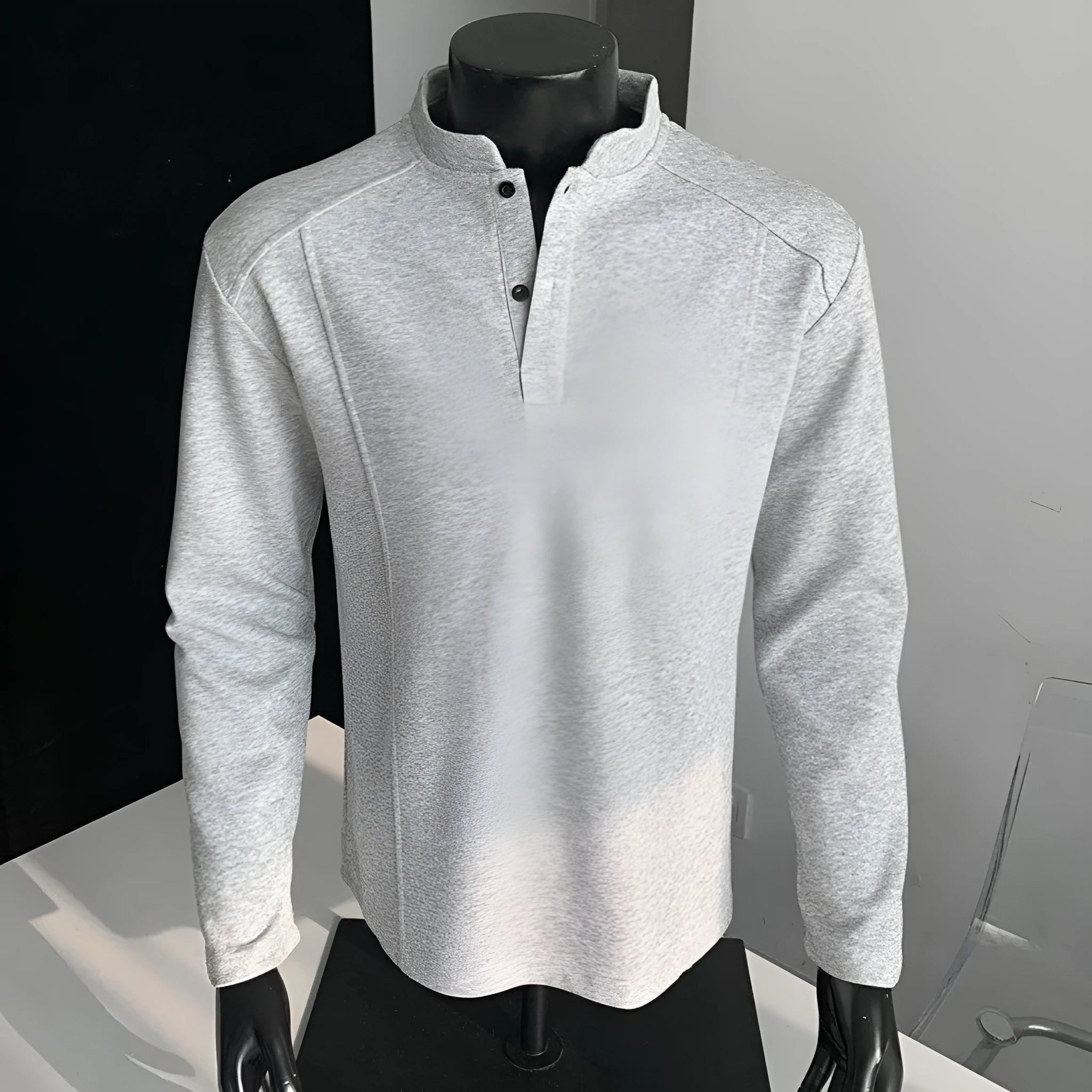 Men's loose-fit long-sleeve polo shirt with a stand-up collar and asymmetric patchwork design in Chinese cotton.