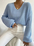 Women's solid colour polyester pullover top in loose casual fit with long sleeves