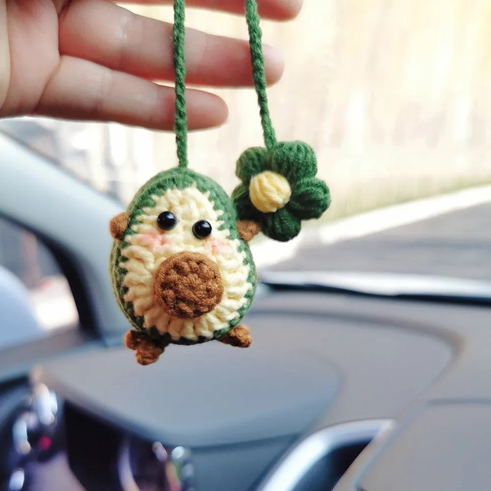 Handmade crocheted avocado rainbow flower car pendant in wool with cartoon styling