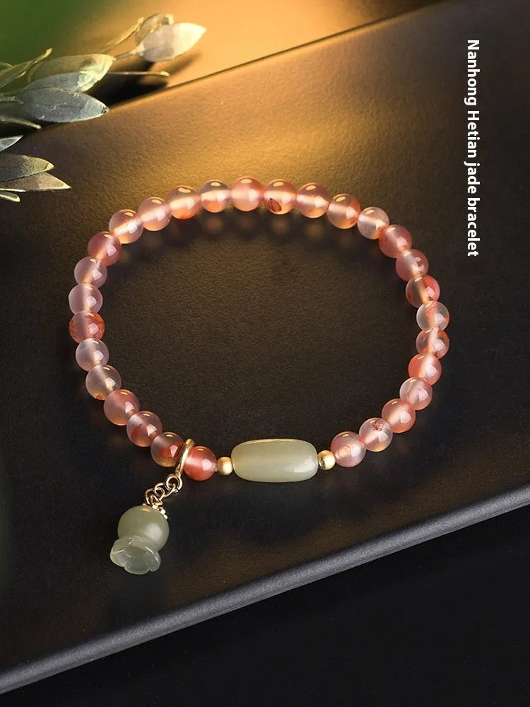 Nanhong agate bracelet with flower design and bamboo joint elements in ethnic style