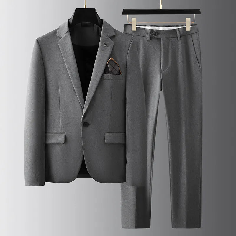 Men's slim fit casual suit set in black, three-piece, with slim tie, full body view