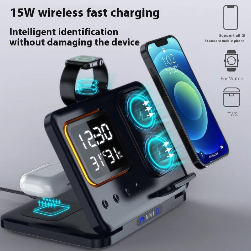 Black and white wireless charging dock station with digital clock display charging a phone, watch and headphones