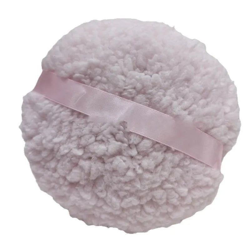 Oversized rectangular plush powder puff in white, skin colour, or pink for makeup application