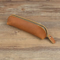 Square handmade genuine cowhide leather pencil case with zipper in black, brown, dark brown, or yellow.