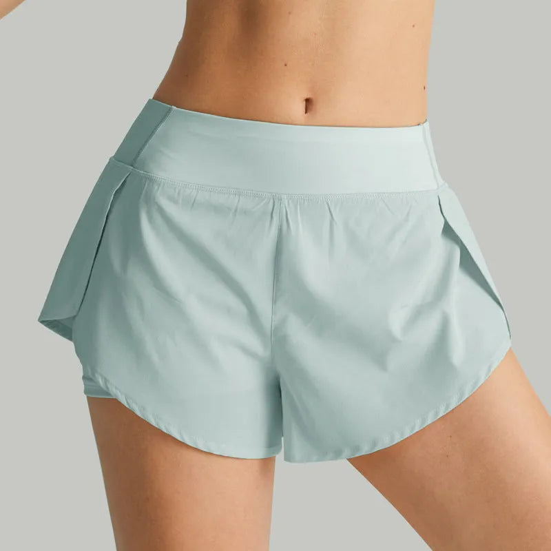 2-in-1 active shorts in Light Blue, polyester fibre, size M, flat lay view showing outer short and built-in liner