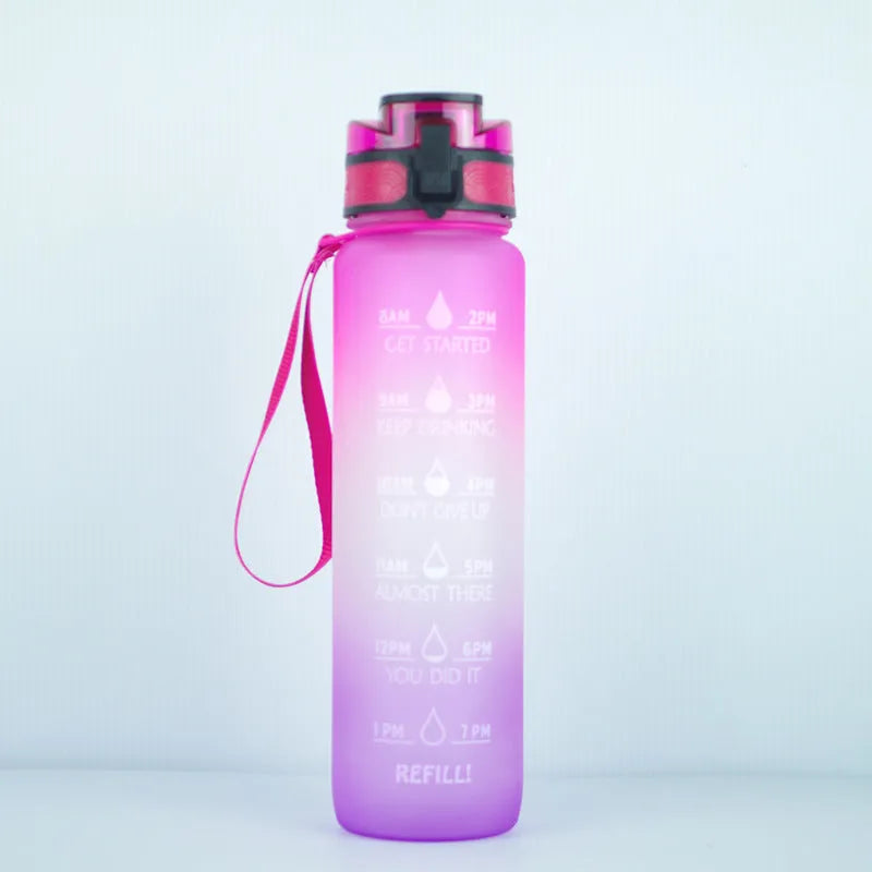 Transparent 1000ml sports water bottle with fruit infuser showing BPA-free Tritan construction