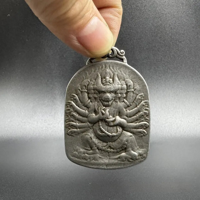 Antique Chinese style geometric iron pendant with Yamantaka Aryaacalanatha design.