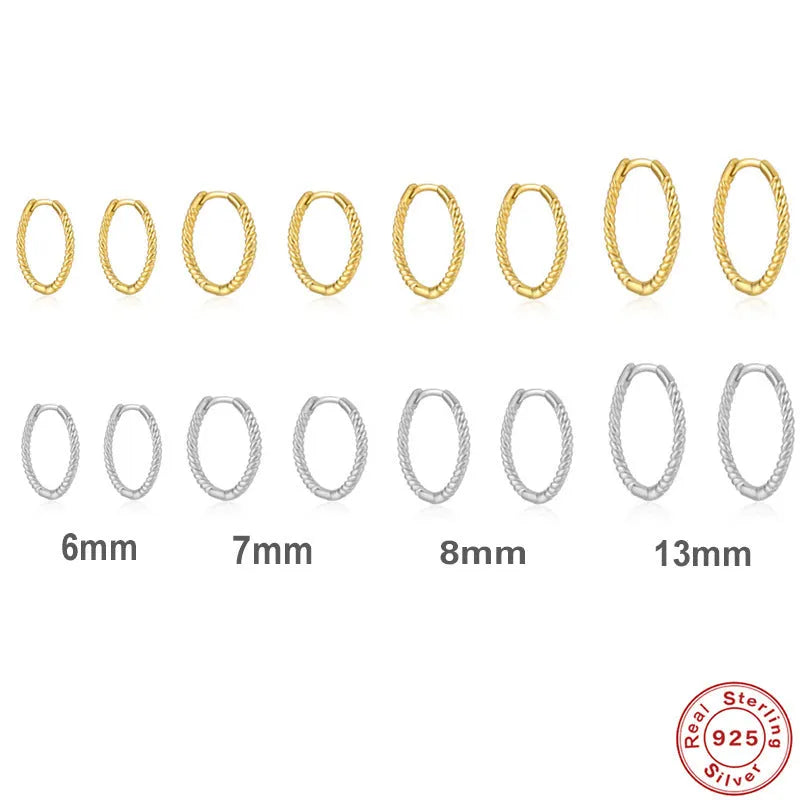 A pair of twisted sterling silver round ring earrings in a gold colour finish, shown at 13mm size.