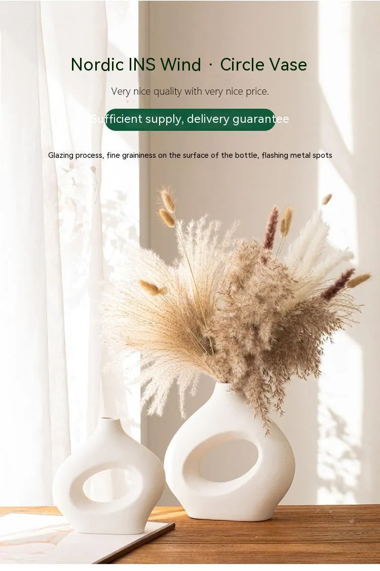 Ceramic soft vase second generation, handmade glazed, white large size on a table as decorative centrepiece