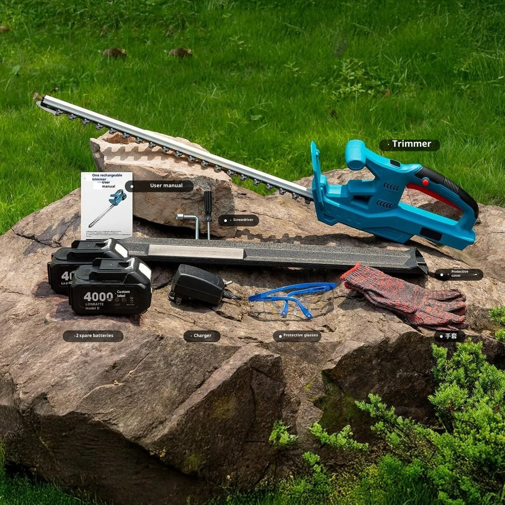 Lithium battery wireless electric hedge trimmer with two batteries, charger, gloves and goggles on a workbench