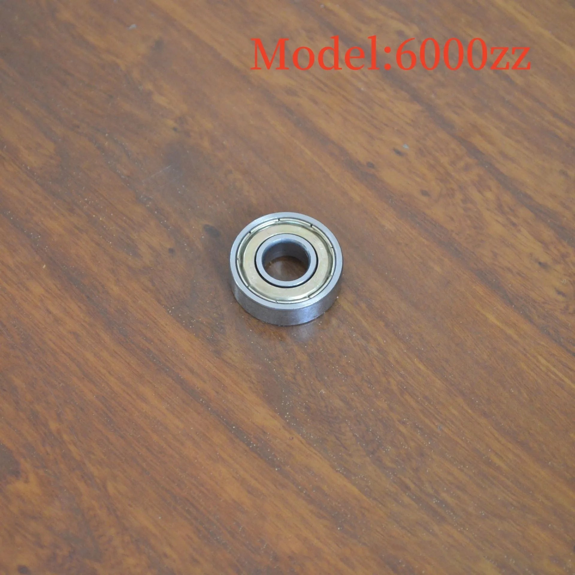 6000zz carbon steel ball bearing showing 10x26x8mm dimensions and iron retainer