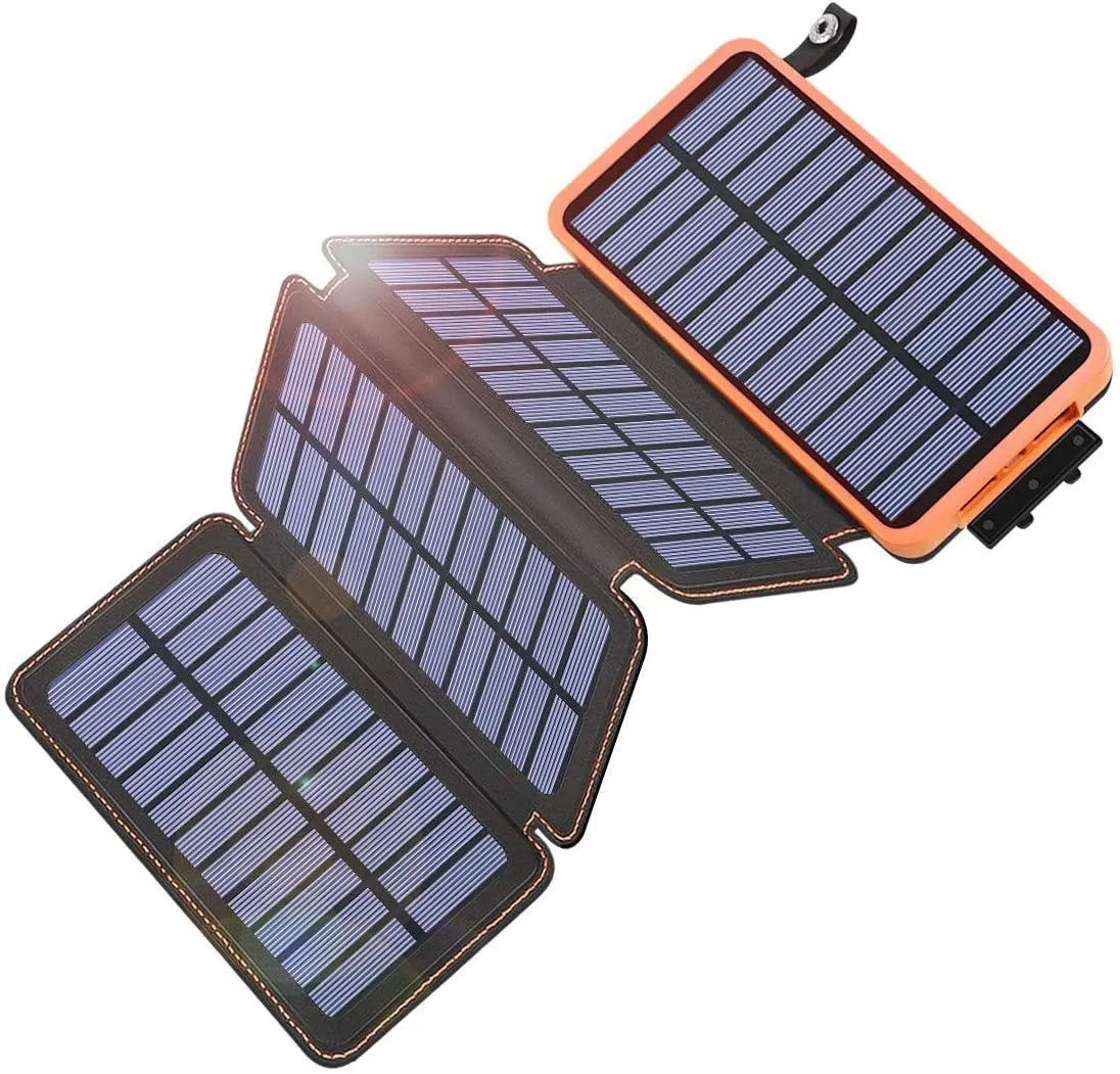 Black outdoor solar power bank with a solar panel, LED light, and soft leather finish, shown with a charging cable.