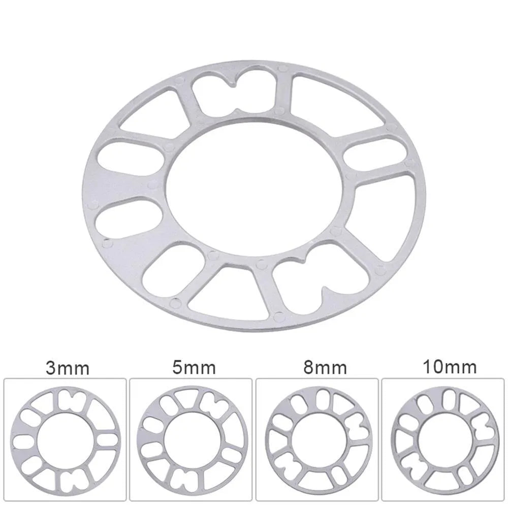 Set of four automotive wheel hub spacer gaskets showing different thicknesses of 3mm, 5mm, 8mm, and 10mm.