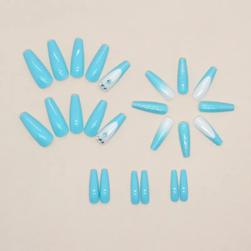 Long ballet style false nails with solid smart blue diamond colour and adhesive glue