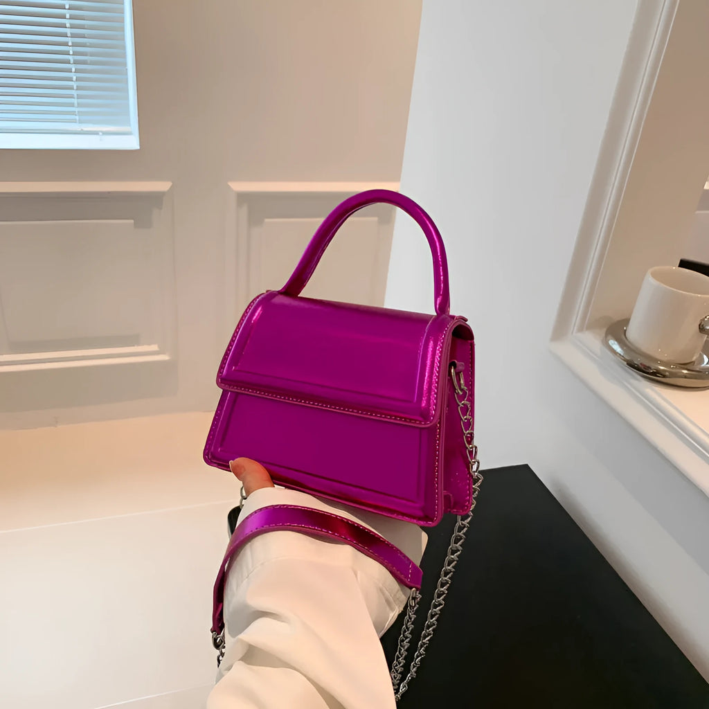 Women's retro crossbody bag in six colour options showing horizontal square shape and shoulder strap