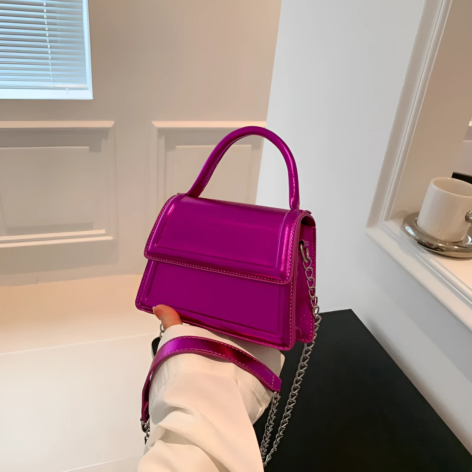 Women's retro crossbody bag in six colour options showing horizontal square shape and shoulder strap