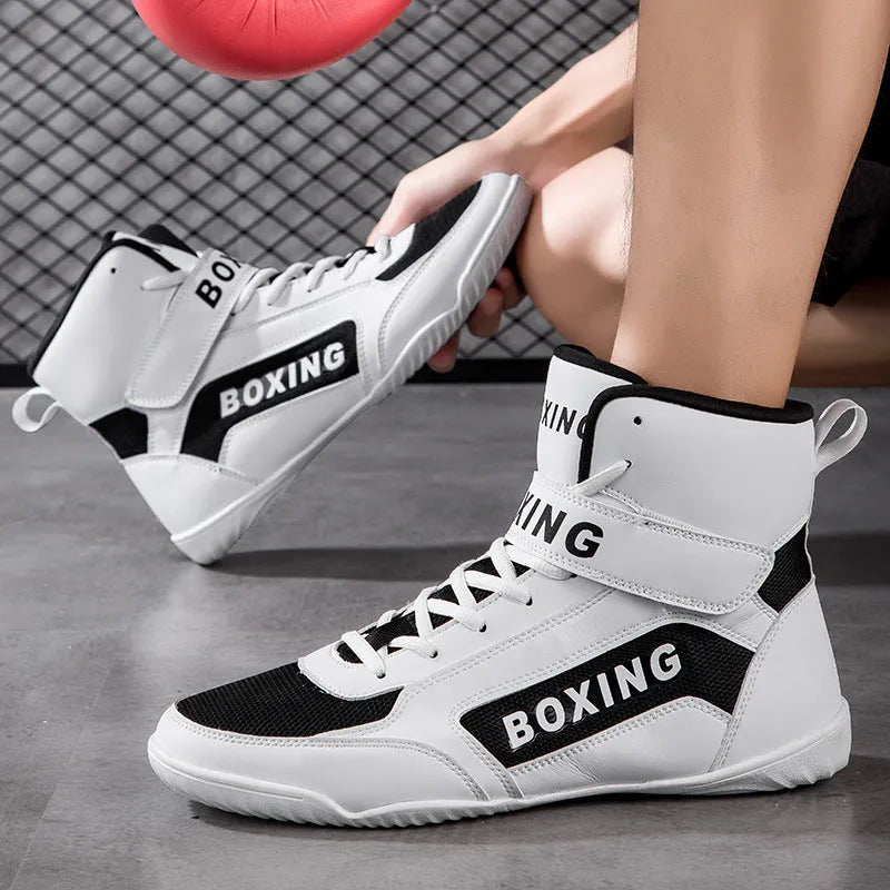 High-top wrestling shoes with non-slip rubber outsole and frosted microfibre mesh upper in white or black