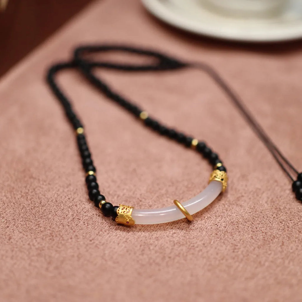 Women's Chinese style necklace with frosted black agate and white chalcedony stones in 925 silver U-shaped pendant
