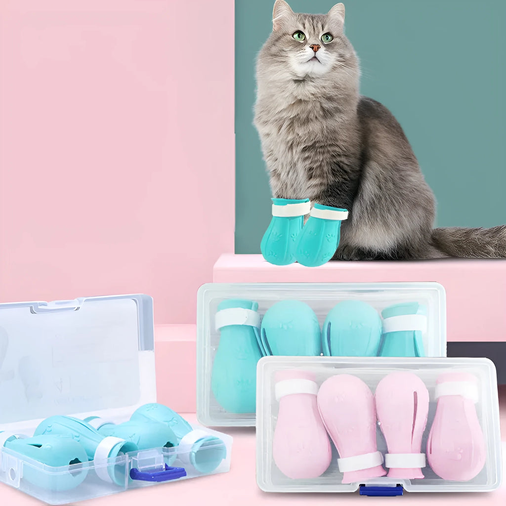 Set of four adjustable cat foot claw covers in light blue, light green, and pink, made from TPE with drainage holes and Velcro straps.