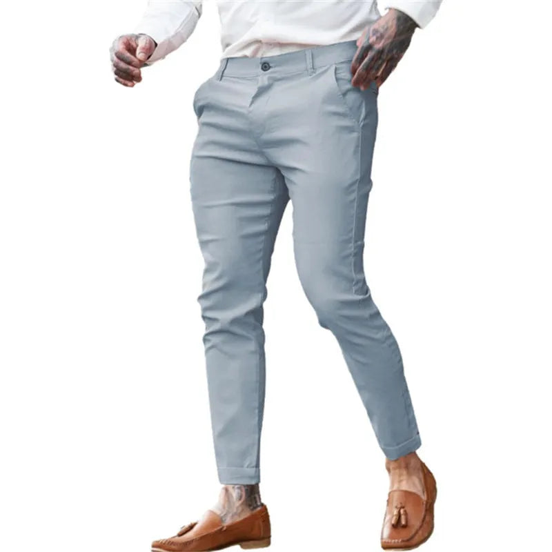 Men's slim fit pencil pants in twill cotton stretch fabric shown in a solid colour.