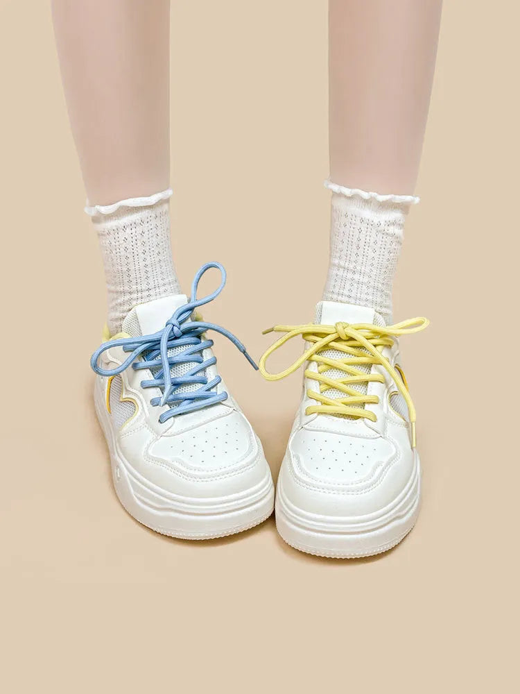 Women's mesh casual sneakers in Meow Rabbit Sea Salt Cheese colour with cross straps and rubber sole