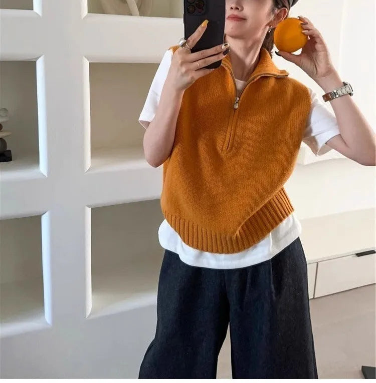 Retro half zip sleeveless knit vest in orange with 3D pattern detail