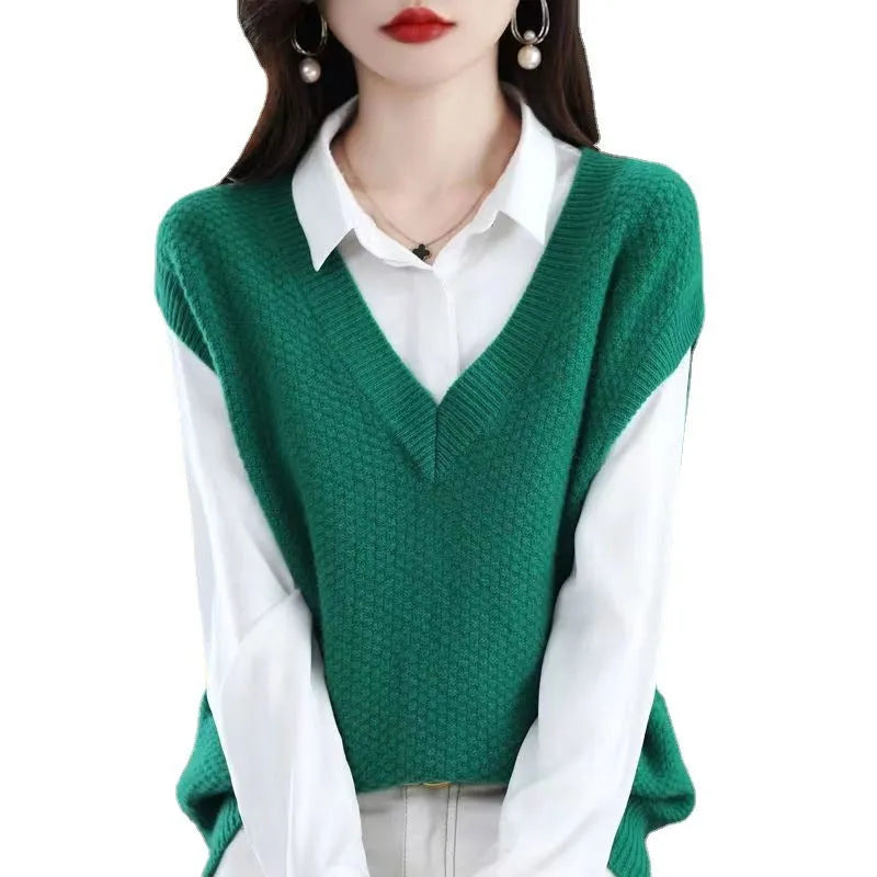 V-neck sleeveless knitted vest with 3D effect pattern available in multiple colours