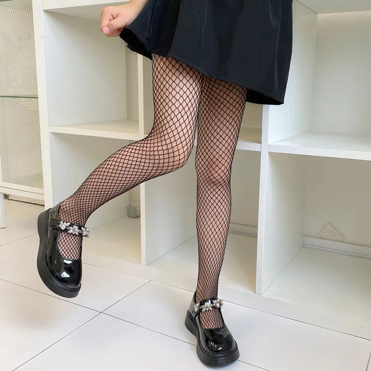 Women's mesh pattern pantyhose in black and white with large, medium, and small net designs