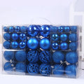 Boxed set of 100 colourful PVC Christmas tree balls in 3-6cm sizes on a neutral background
