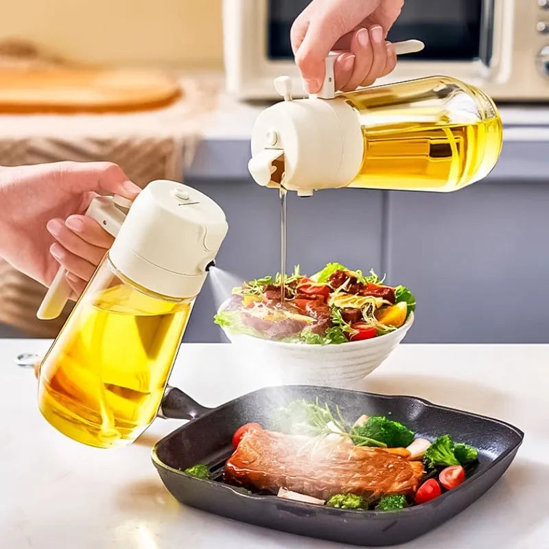 Glass olive oil sprayer and pour bottle with ergonomic handle in beige, yellow, green, or black, 470ml capacity.