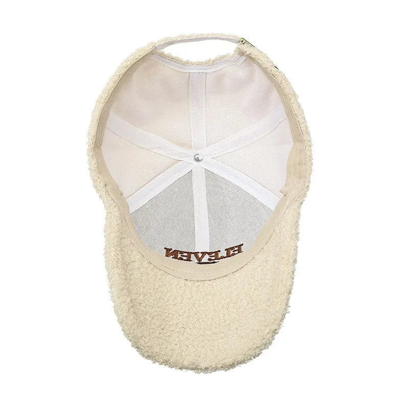 Winter baseball cap in machine-embroidered polyester with adjustable strap and dome crown in seven colour options