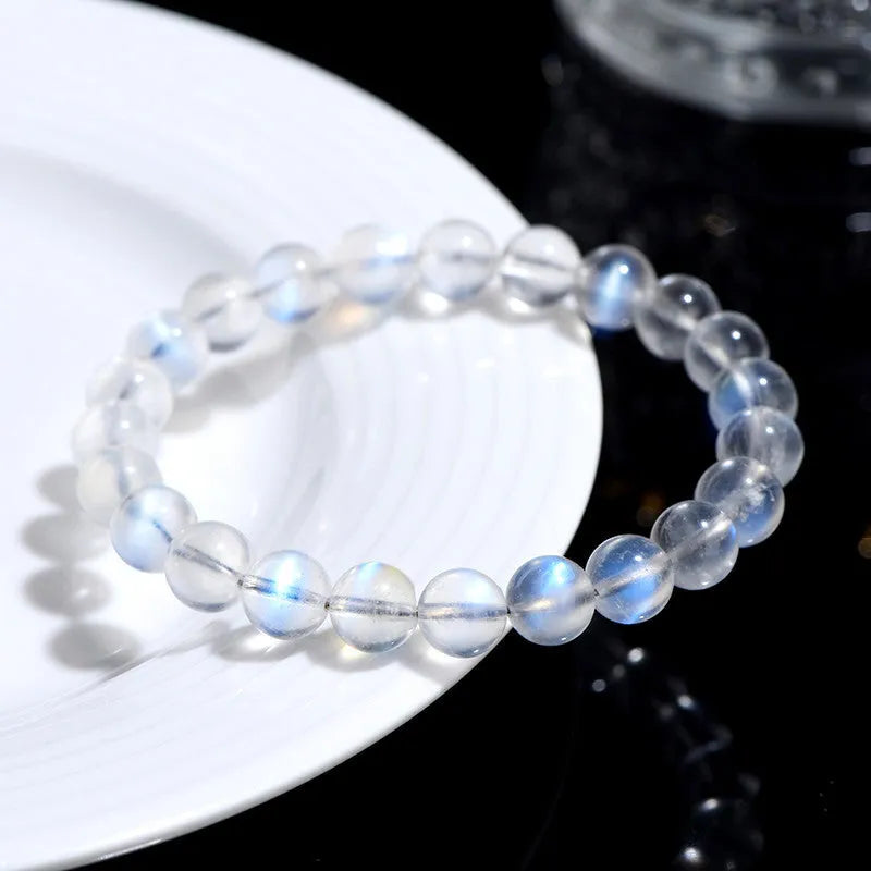 Natural cream body crystal bracelet with blue moonlight gemstone in simple unisex design