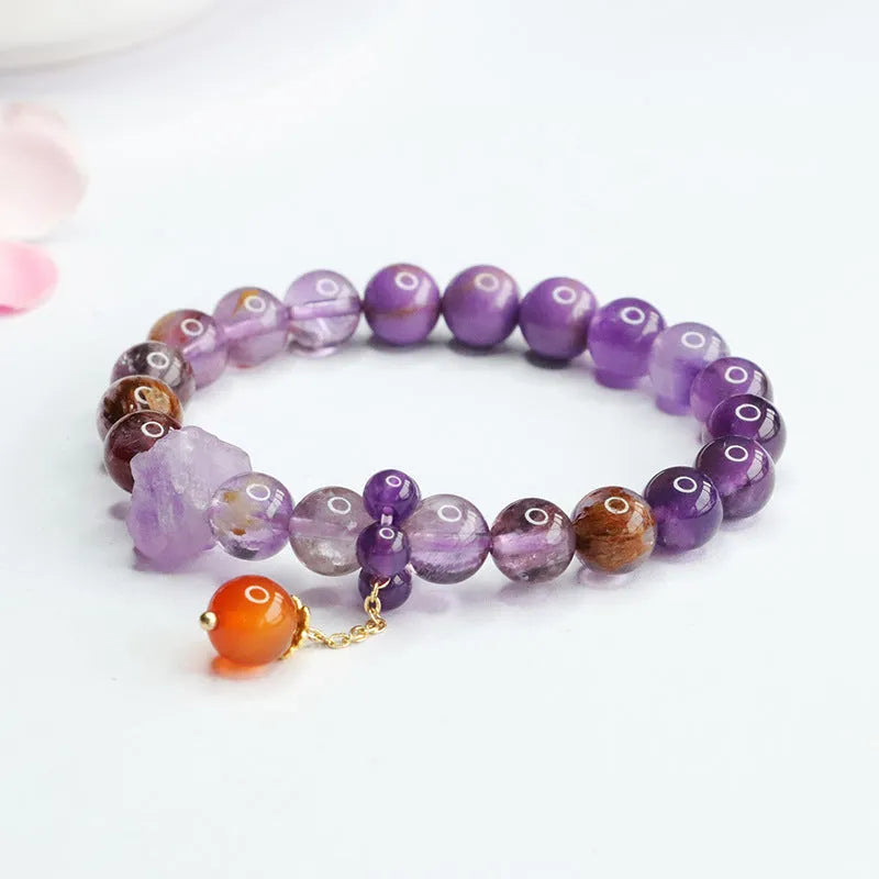 Natural nine purple fire Duobao crystal bracelet in Mori style with amethyst and red agate stones.