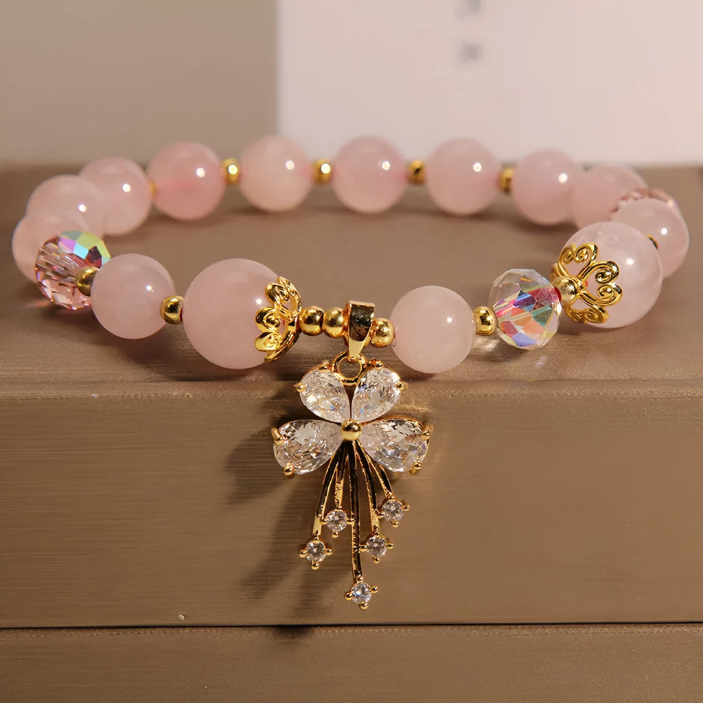 Normcore style unisex crystal lucky pearl bracelet aquamarine butterfly pink crystal butterfly on neutral background