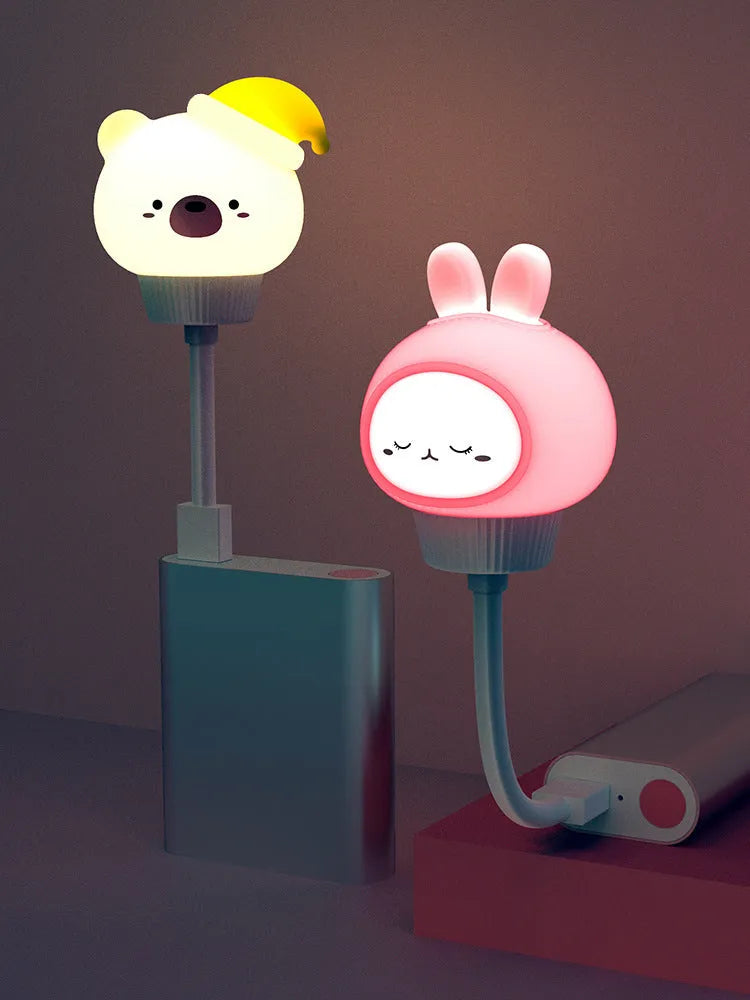 Cartoon animal-shaped USB LED night light in bear design with remote control.