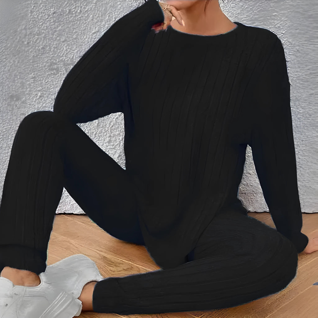 Black sunken stripe two-piece polyester homewear set with regular sleeves, showing top and pants.