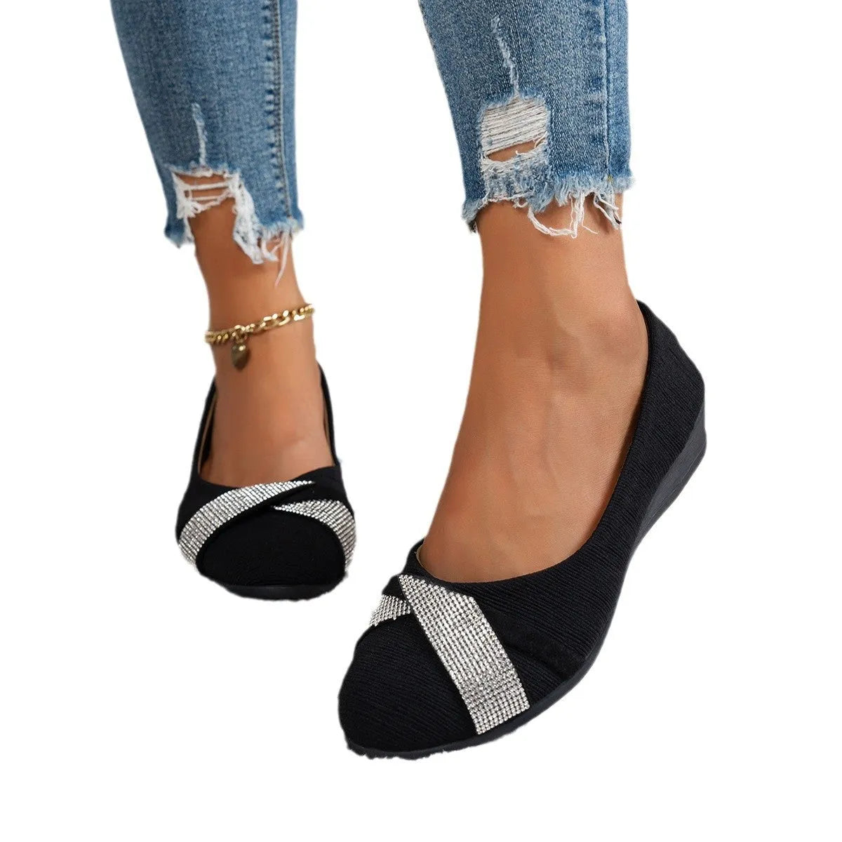 Black women's slip-on casual shoes with round toe, rhinestone detail, and a short chunky heel.