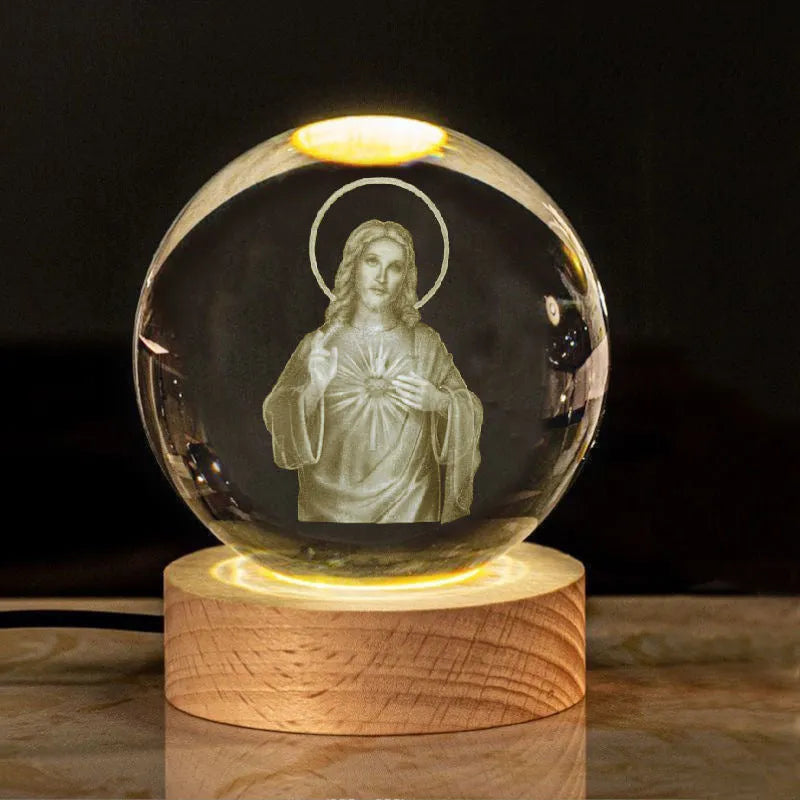 6cm white crystal ball desk ornament with laser-engraved cross design on a solid wood warm light base.