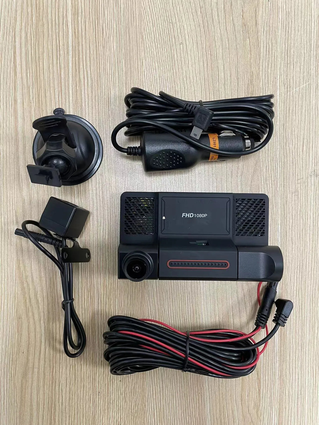 Black three-lens dash cam with 4-inch touch screen for front and rear vehicle recording