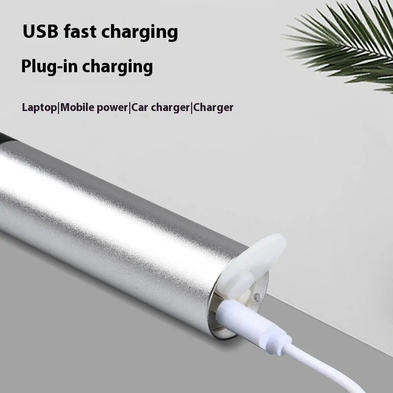 Red light therapy mosquito repellent lamp in black aluminium housing with USB charging cable