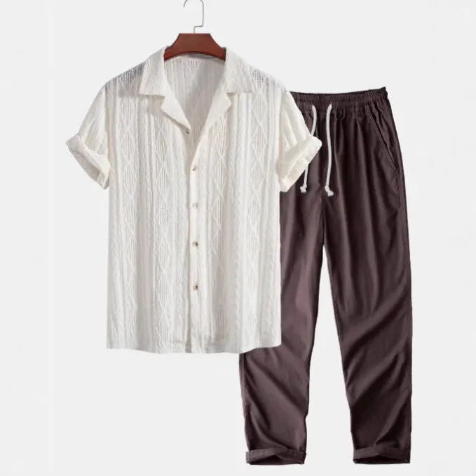 Slim-fit men's camouflage print shirt and trousers casual suit set on a hanger.