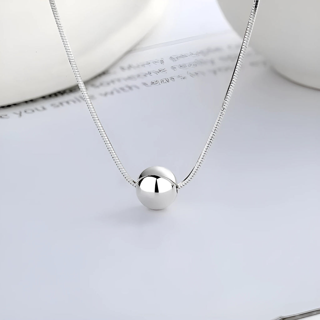 Small ball pendant on delicate 925 silver clavicle necklace with round YFL376 design