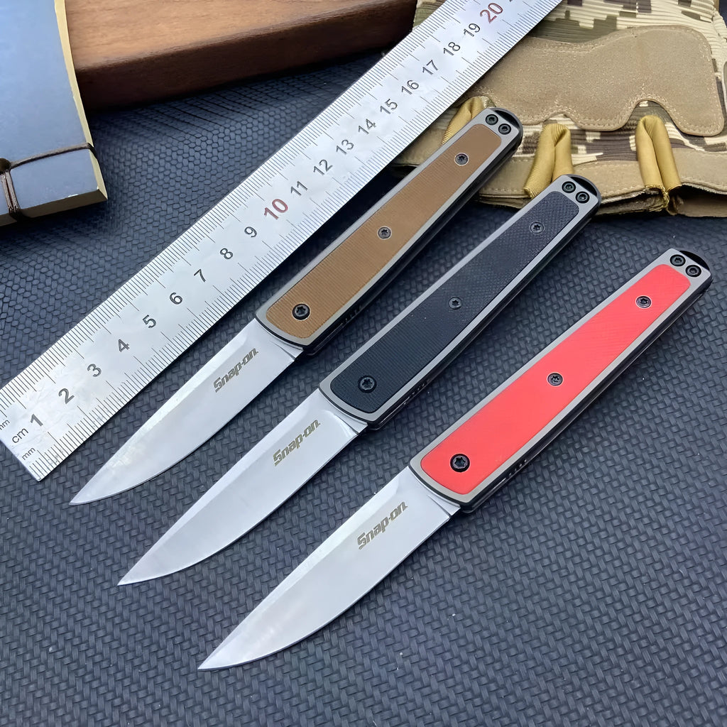 Handmade folding fruit knife with stainless steel blade shown open, in black, red, or brown colour options.