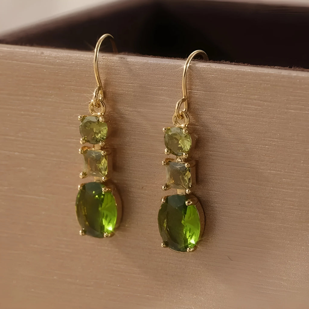A pair of green geometric copper earrings with a quadrilateral shape and retro bohemian style.