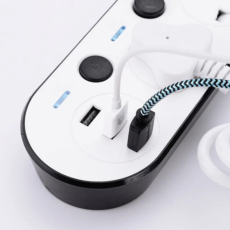 Multi-switch power strip with USB ports showing UK, US, and EU plug options and a coiled cable.
