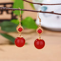 Geometric copper alloy earrings with round red agate beads and S925 silver jasper inlay.